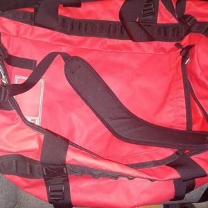 Red North Face Duffle (can also carry as backpack)